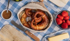 Large Pretzels on table with butter and mustard east side Austin Texas