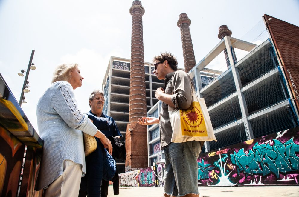 Raval tour guests at the Three Chimneys in Barcelona