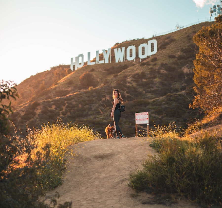 Hiker on a trail to the Hollywood Sign in Los Angeles Griffith Park