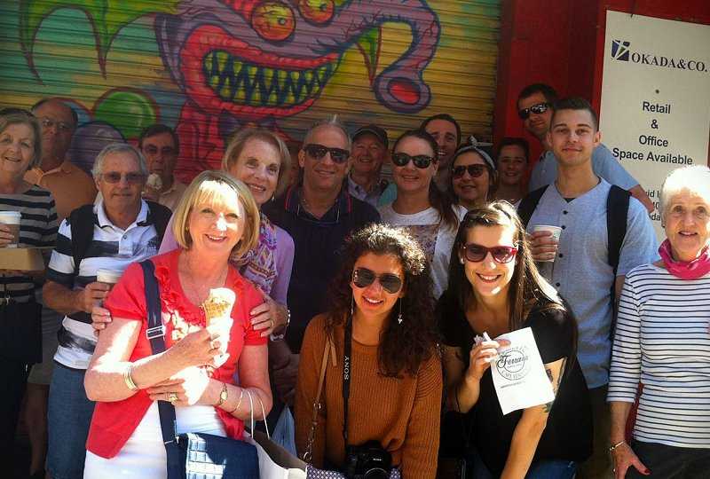 group of people in SoHo NYC smiling