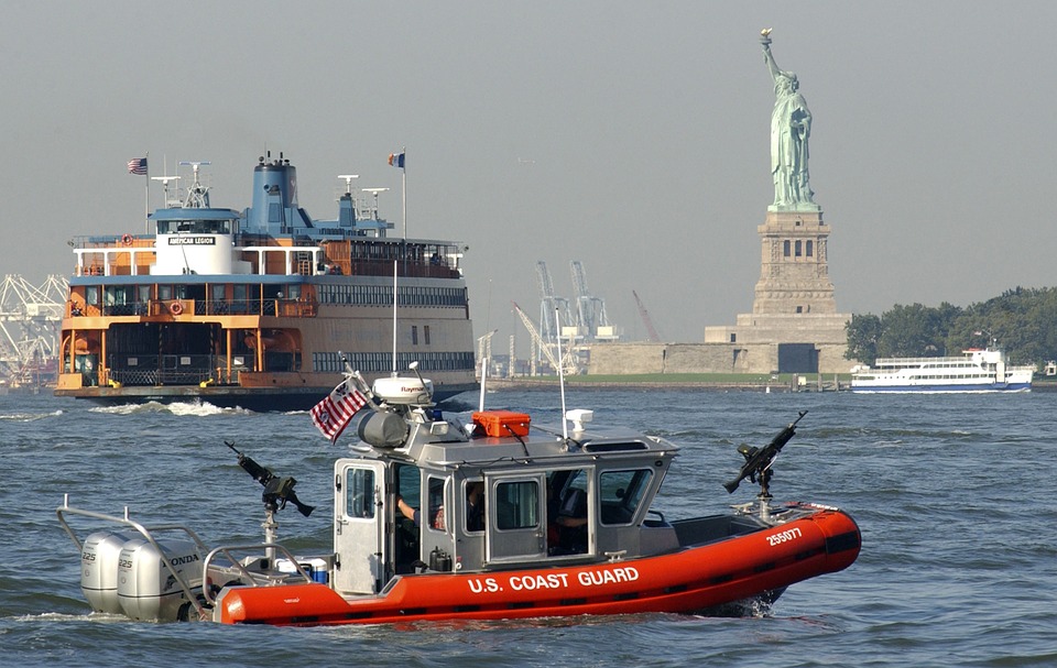 The Coast Guard waves hello to the Staten Island Ferry