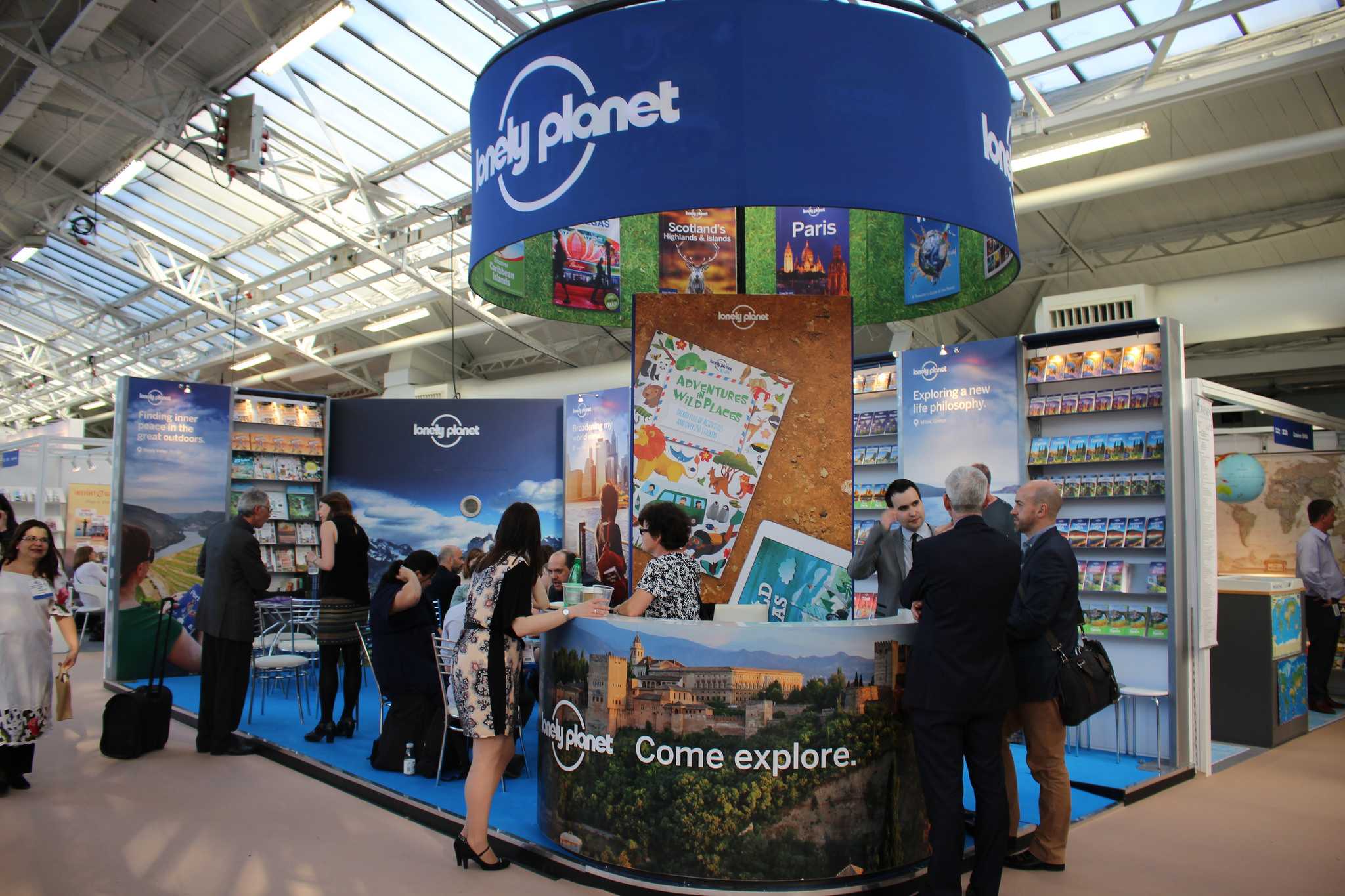 People standing next to a booth