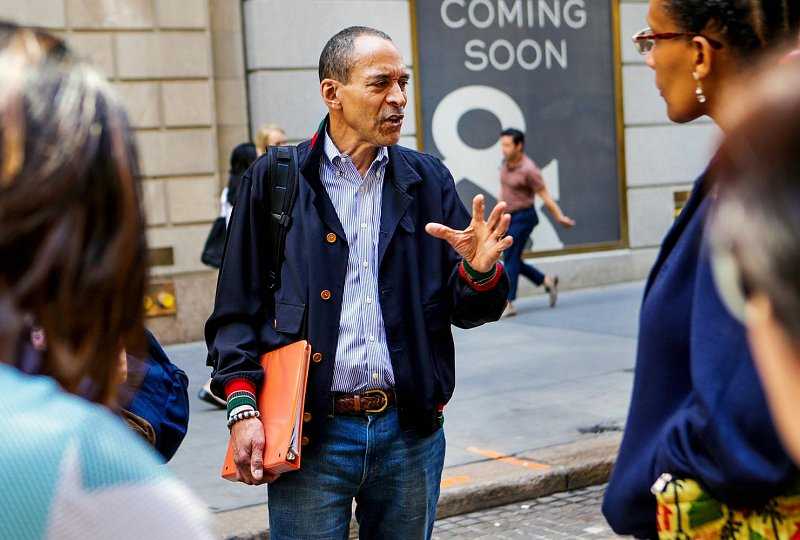 man talking to a crowd