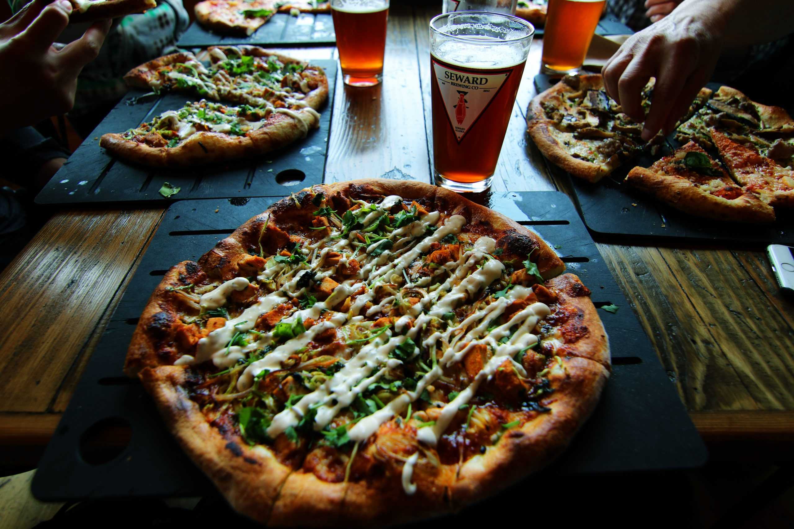 Pizza and beer on a table