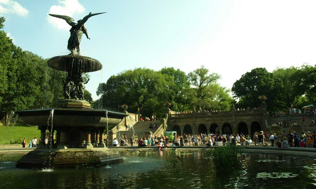 People standing in front of a fountain