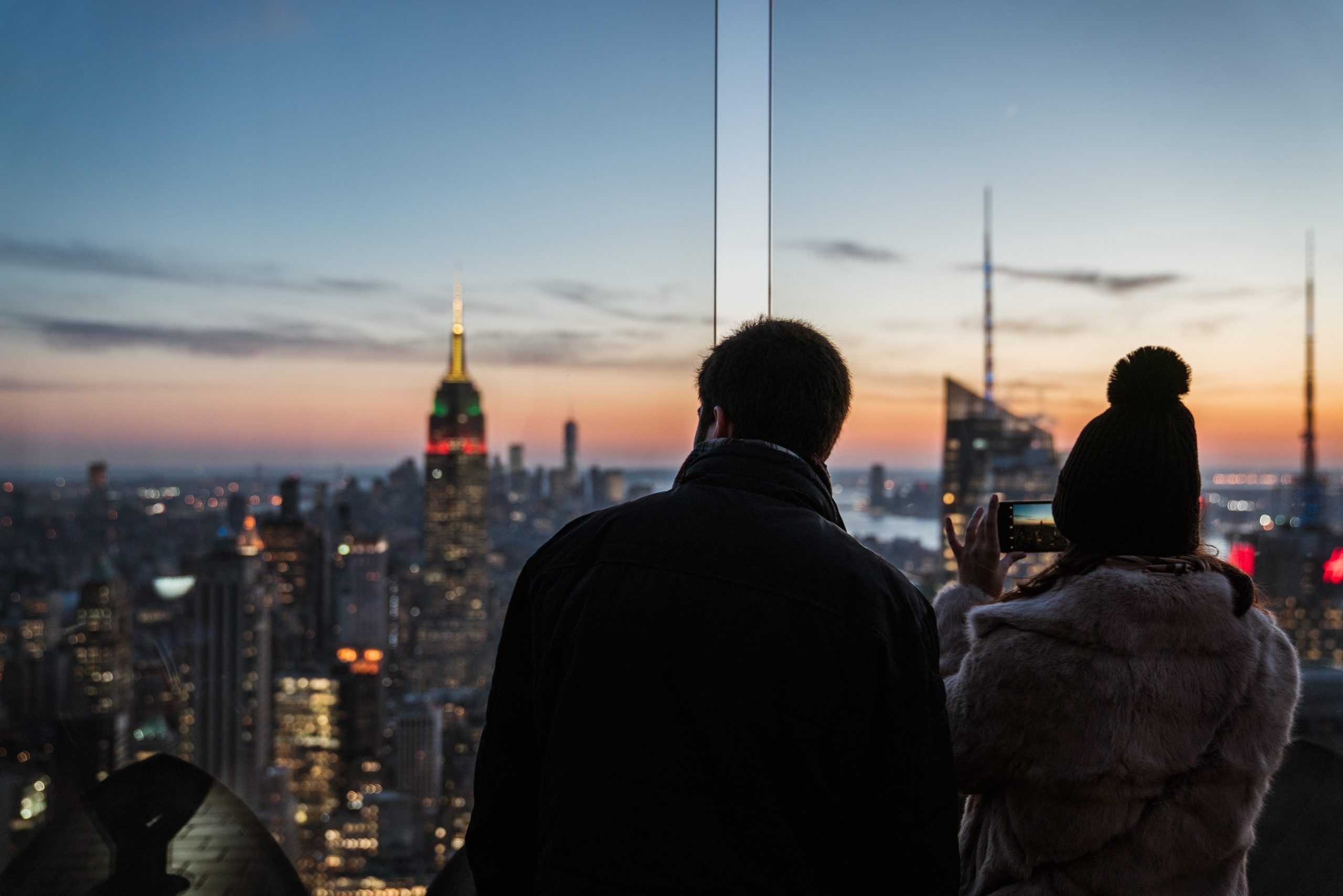 People looking at buildings