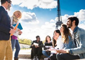 Tour guide leading group outdoors