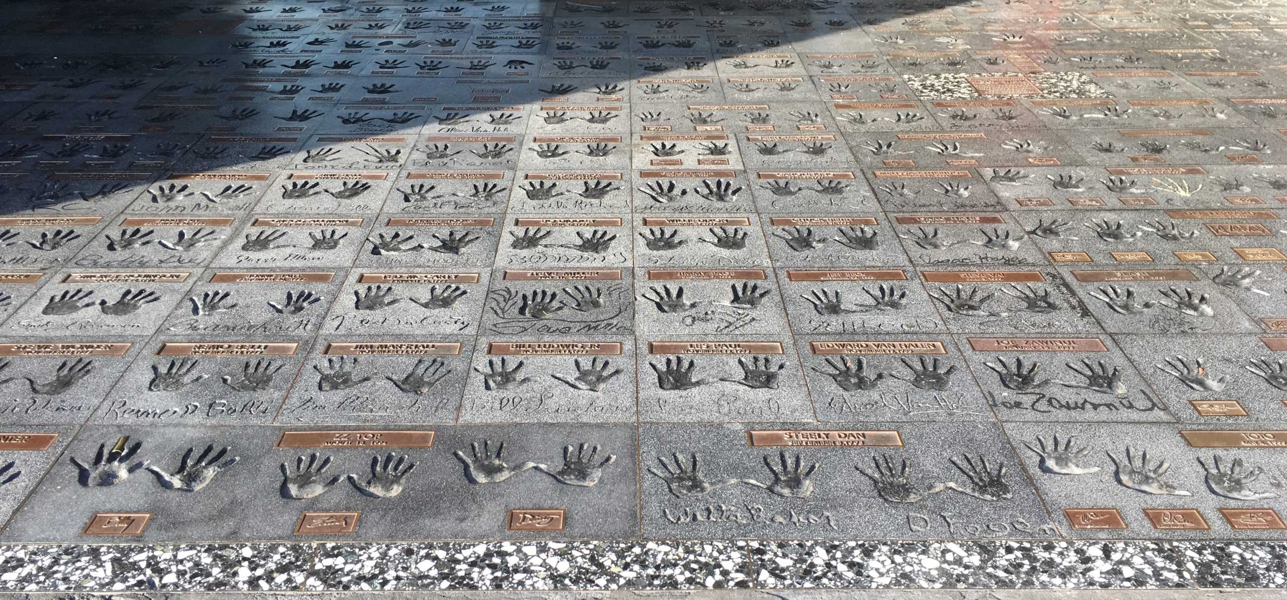 Sidewalk with hand prints