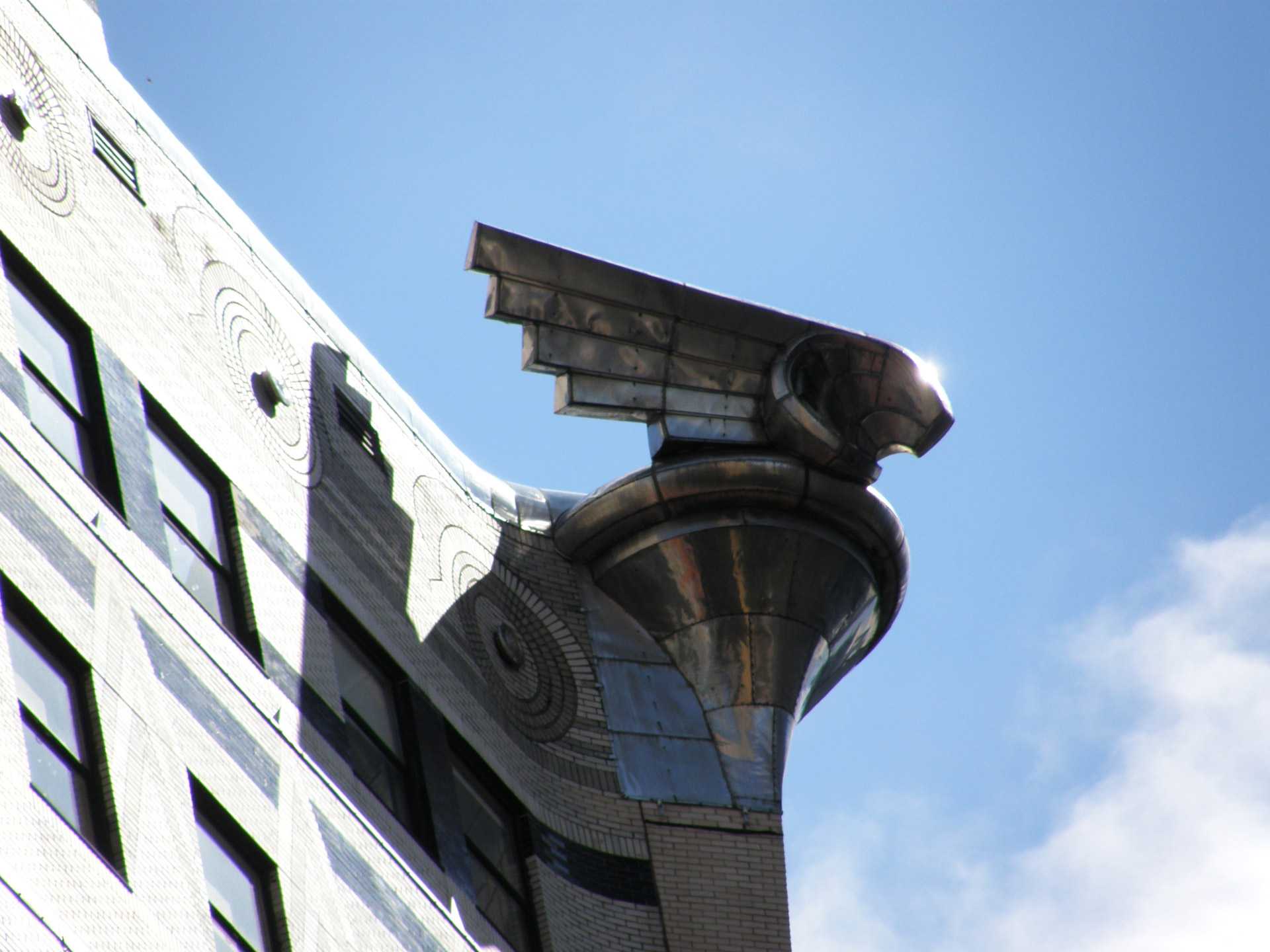 Eagle gargoyle on top of a building