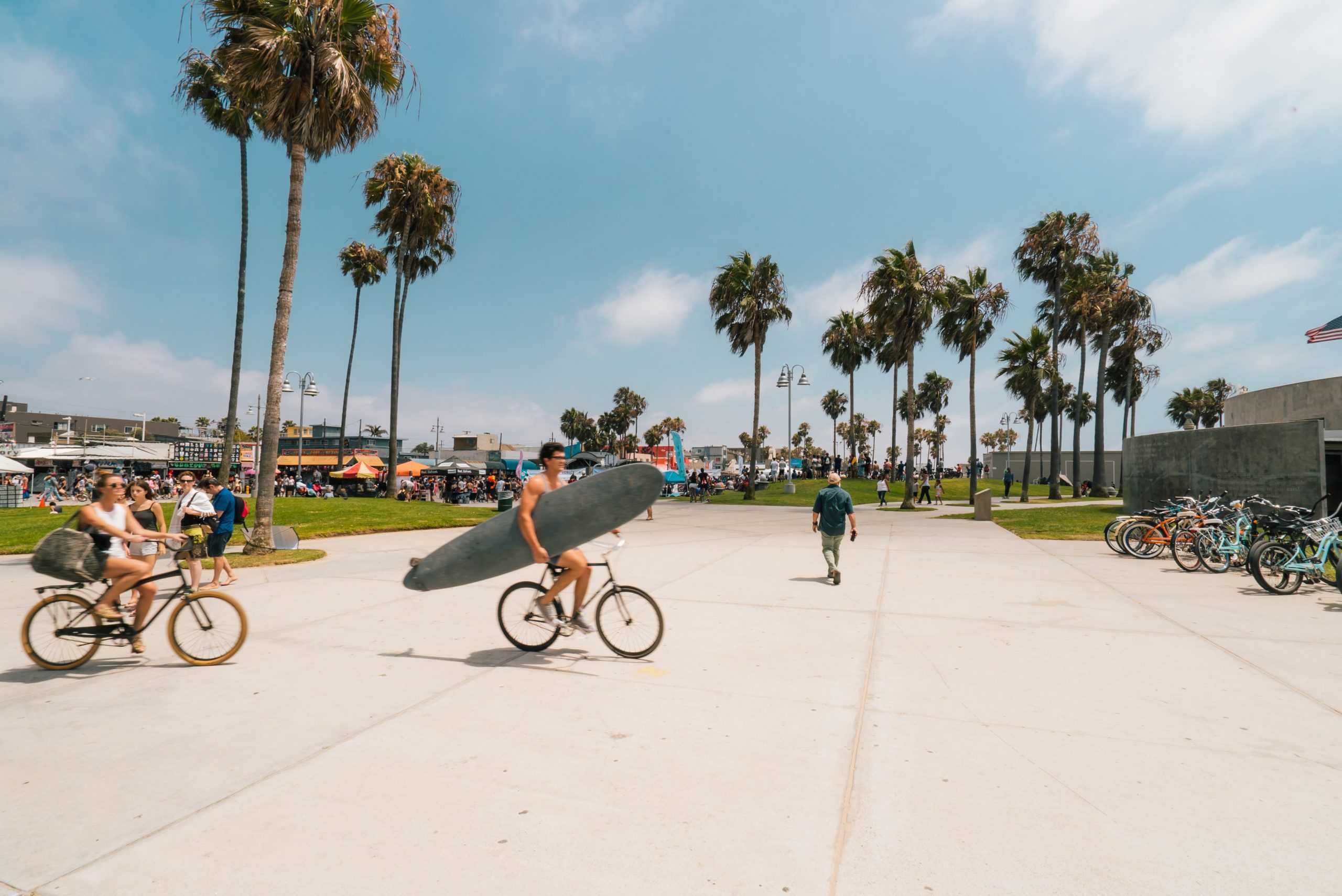 Biking with a surfboard