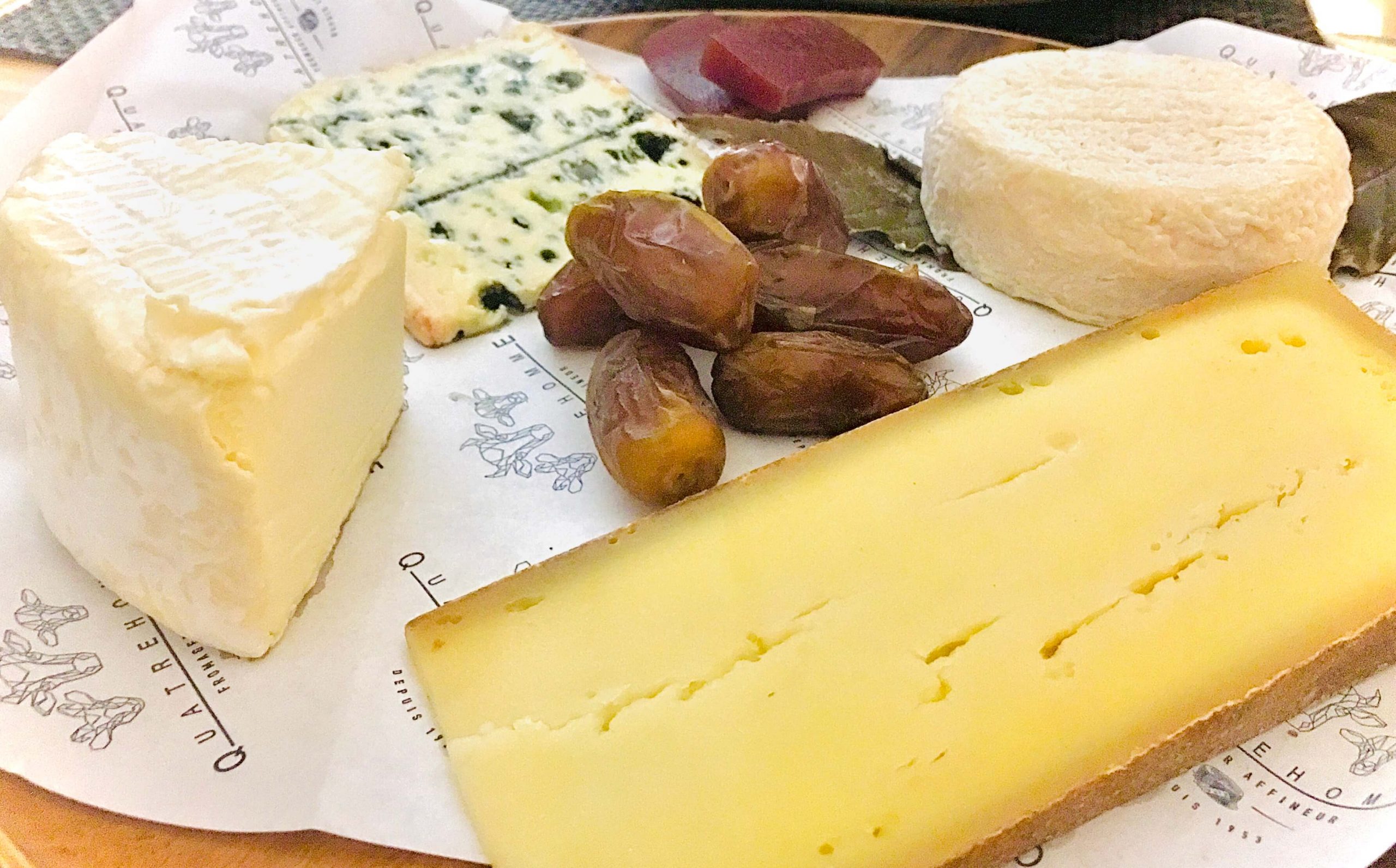 A selection of French cheee, dates and jam