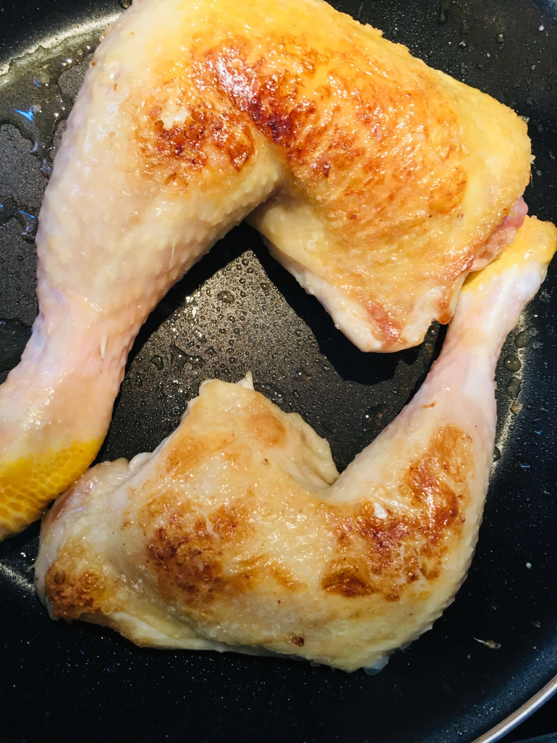 Patrially roasted chicken thighs and legs