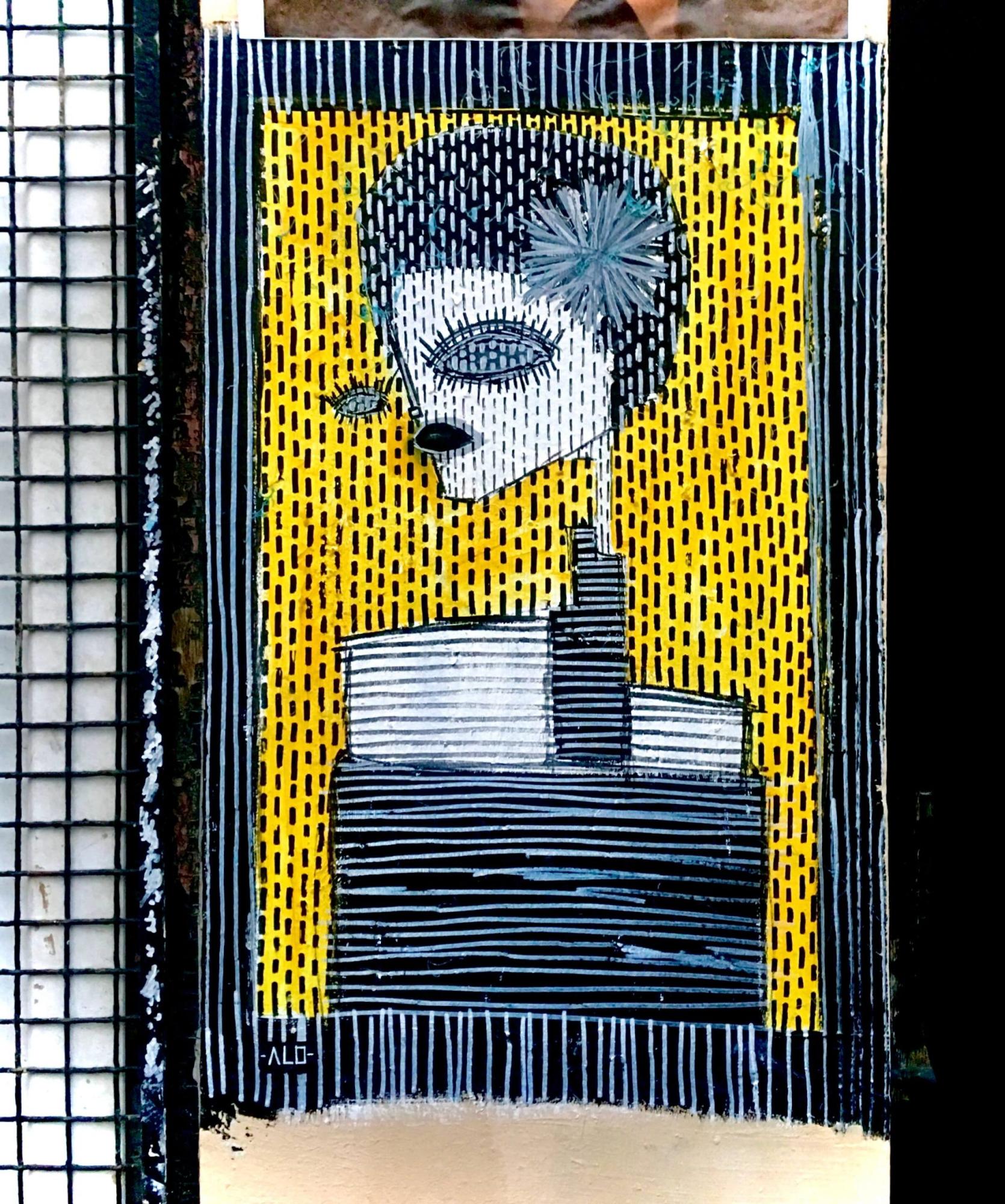 Surreal mosaic street art piece of an exaggerated female character in black and white with yellow background