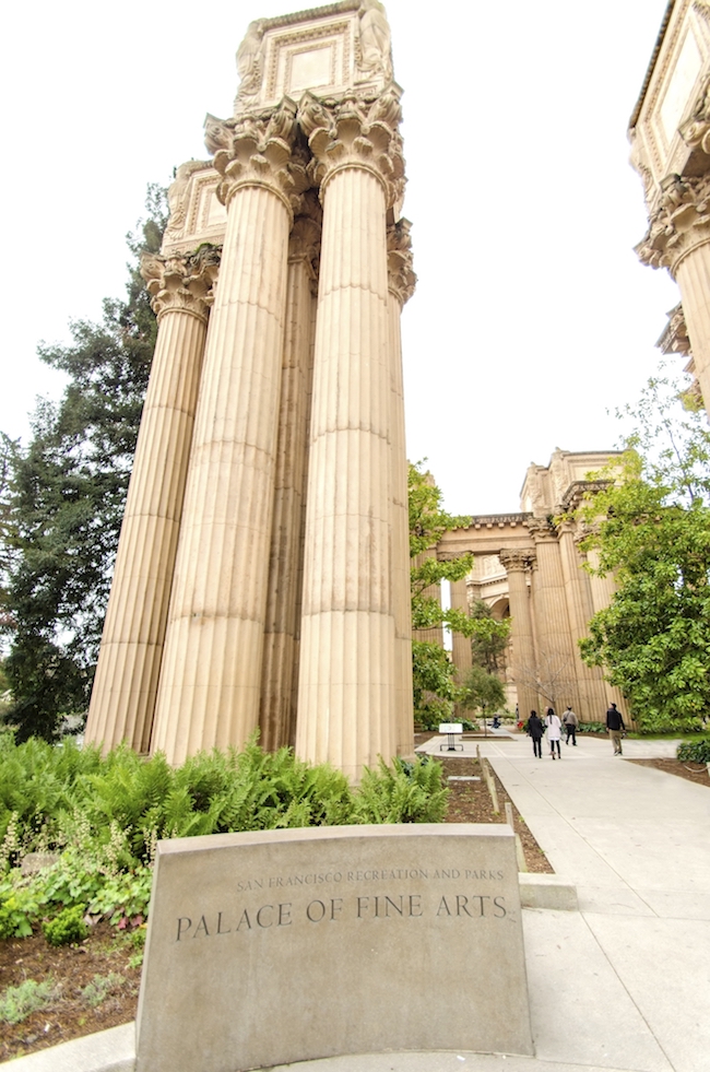 The entrance to the Palace of Fine Arts in San Francisco with a colonnade