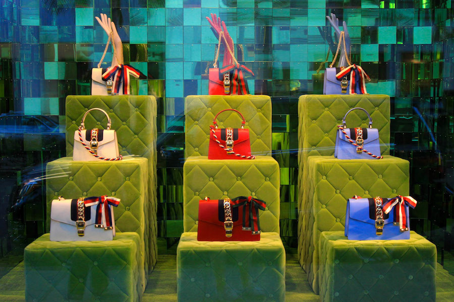 Luxury handbags on Rodeo Drive in a Beverly Hills shop window