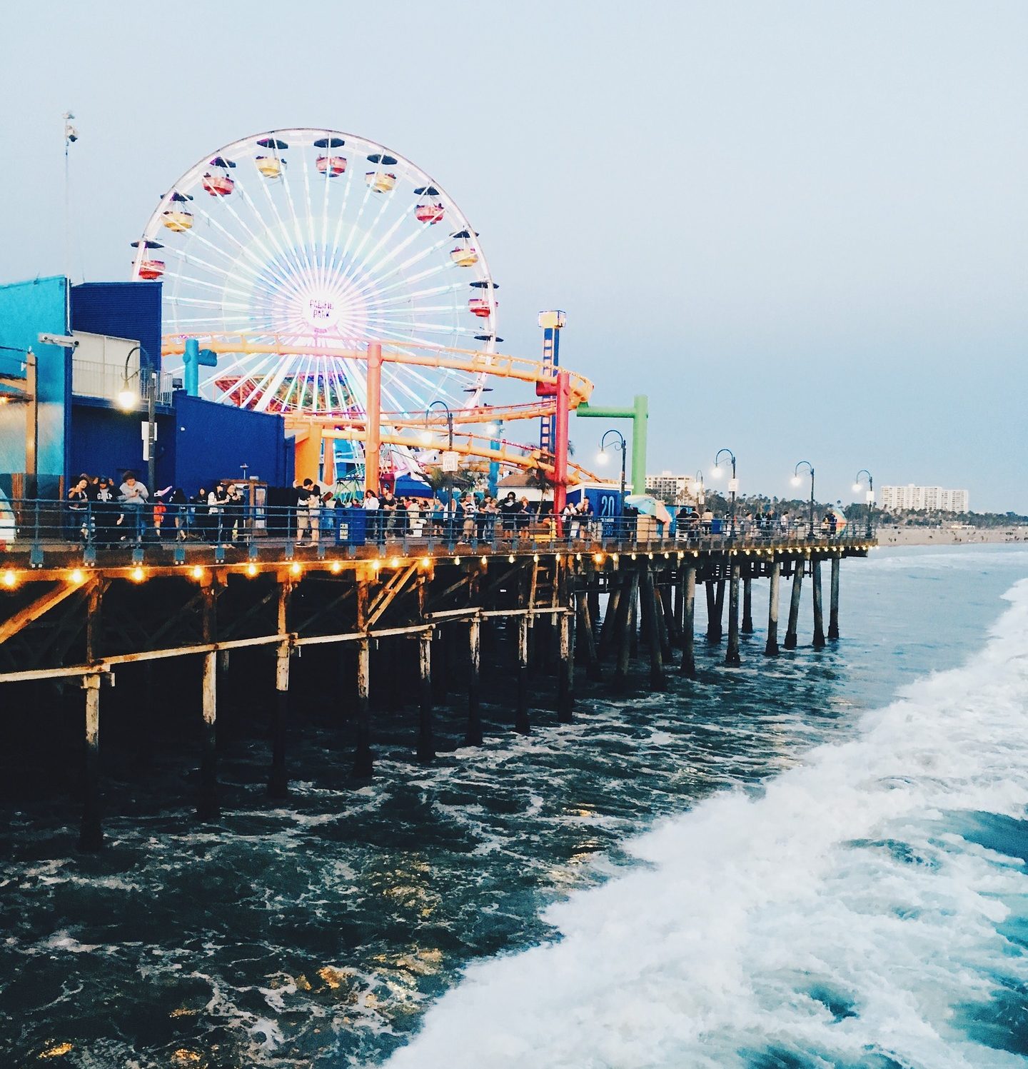 Carnival with Ferris wheel at Santa Monica's famous pier
