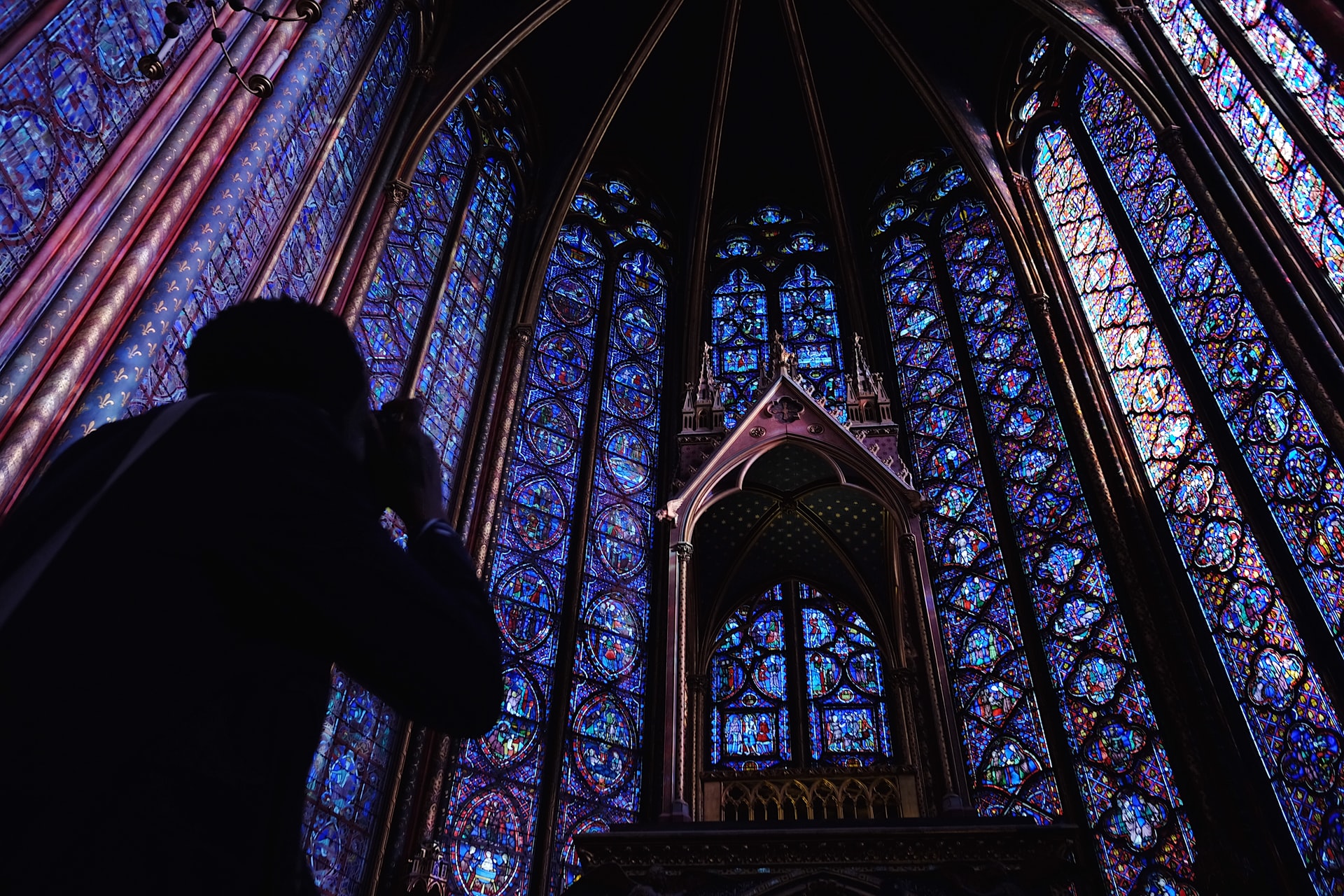 Photographer inside Sainte-Chapelle in Paris