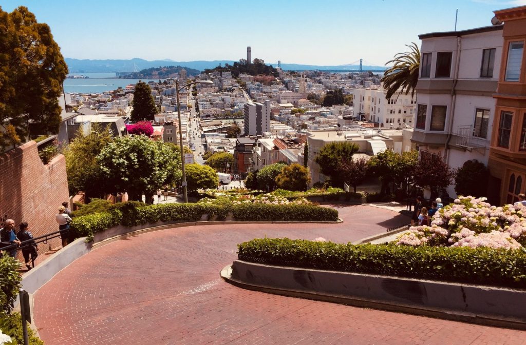 Lombard Street in SF with view of Bay Bridge