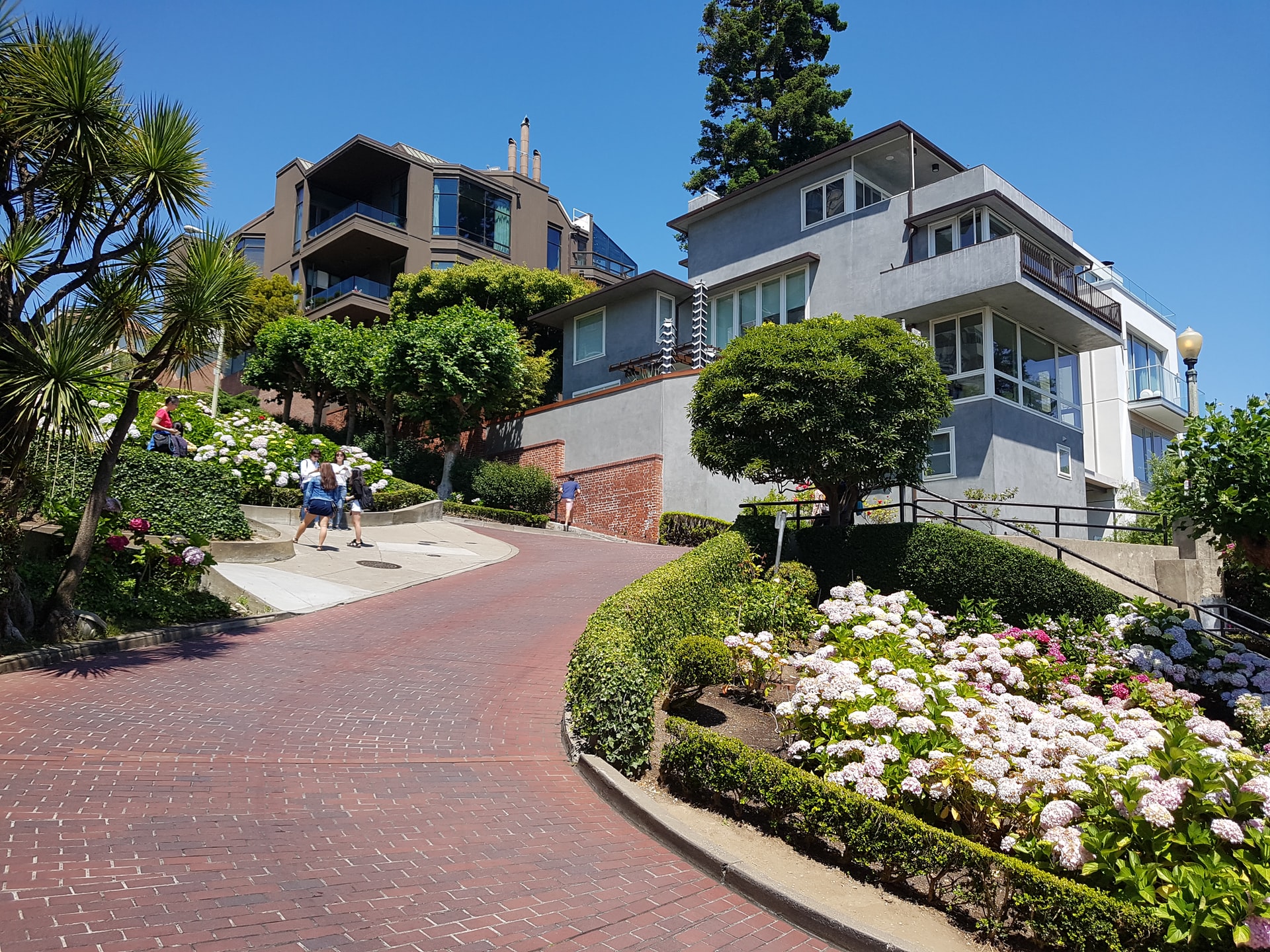 Pedestrians walking down Lombard Street