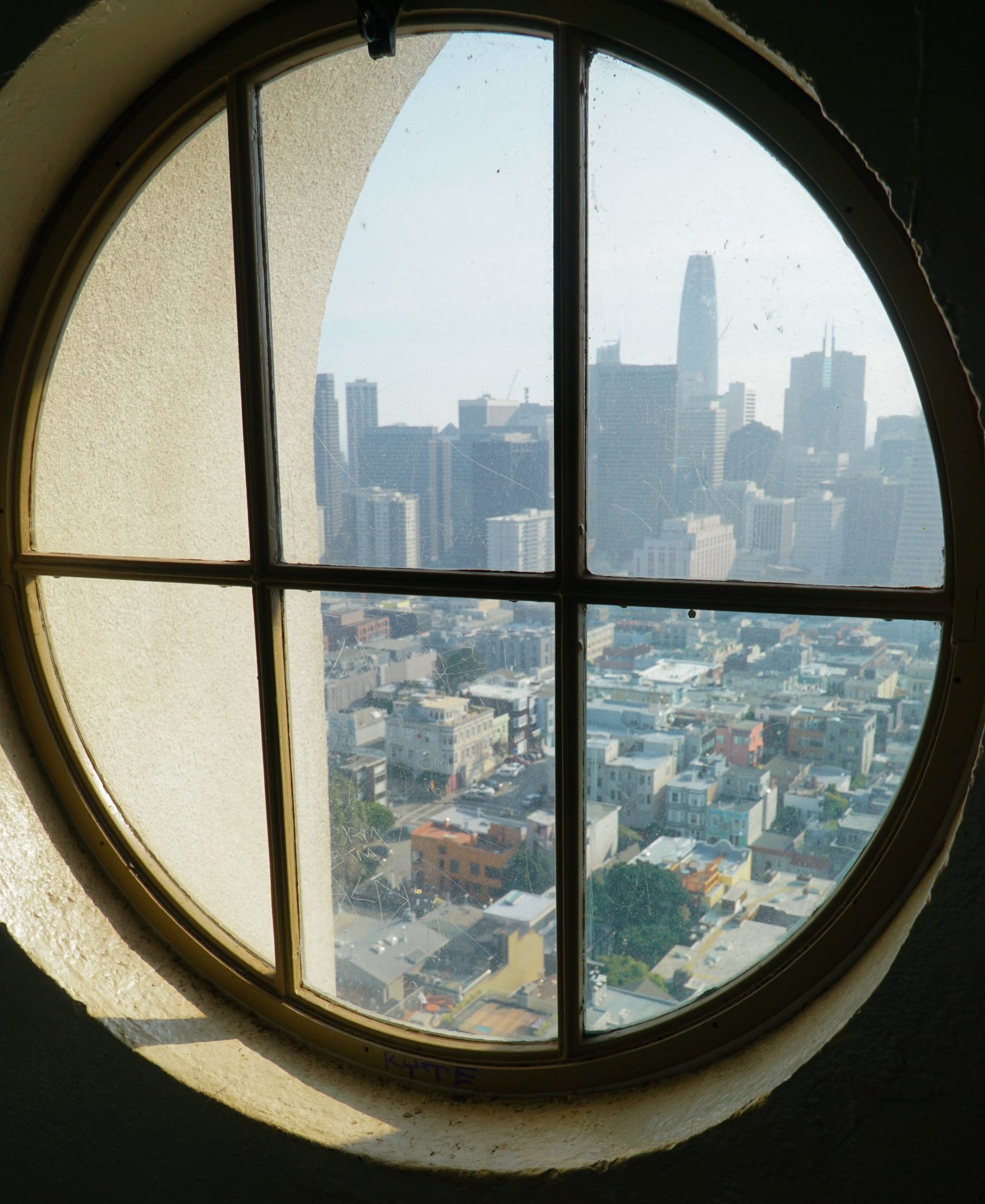 View from the top of Coit Tower through a circular window