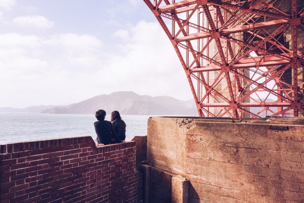 Couple in love in San Francisco near the Golden Gate Bridge