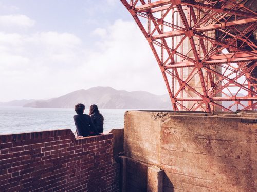 Couple in love in San Francisco near the Golden Gate Bridge