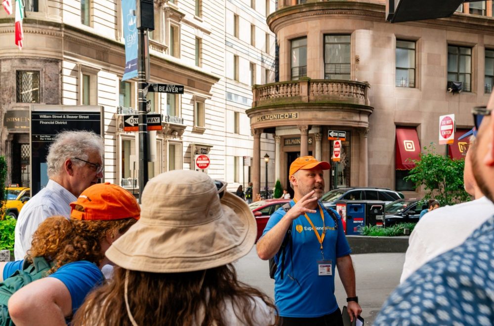 Succession tour group with guide in NYC on walking tour