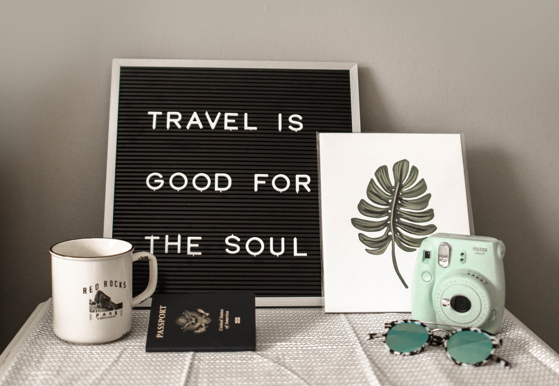 Sign saying Travel is Good for the Soul