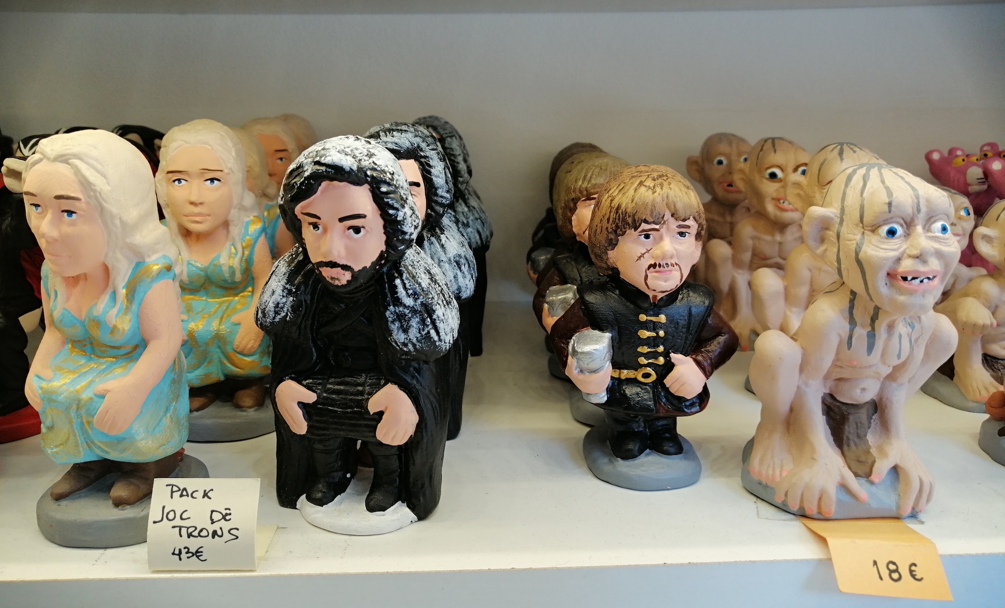 Caganer parody statues