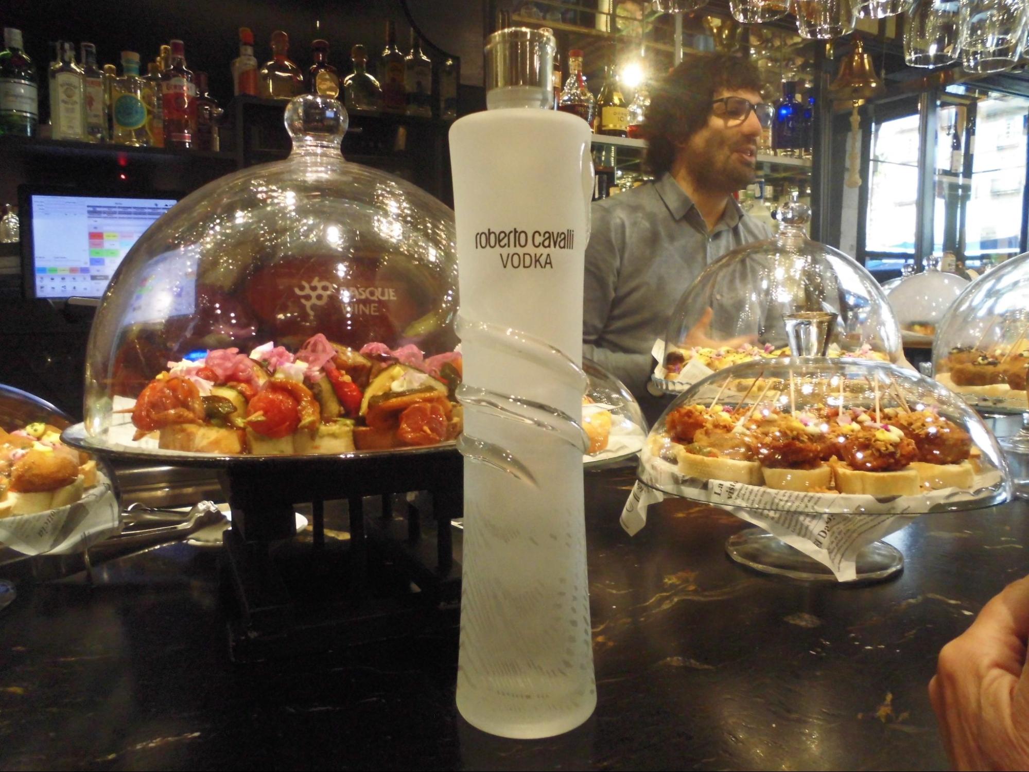 Vodka and tapas at a bar in Spain