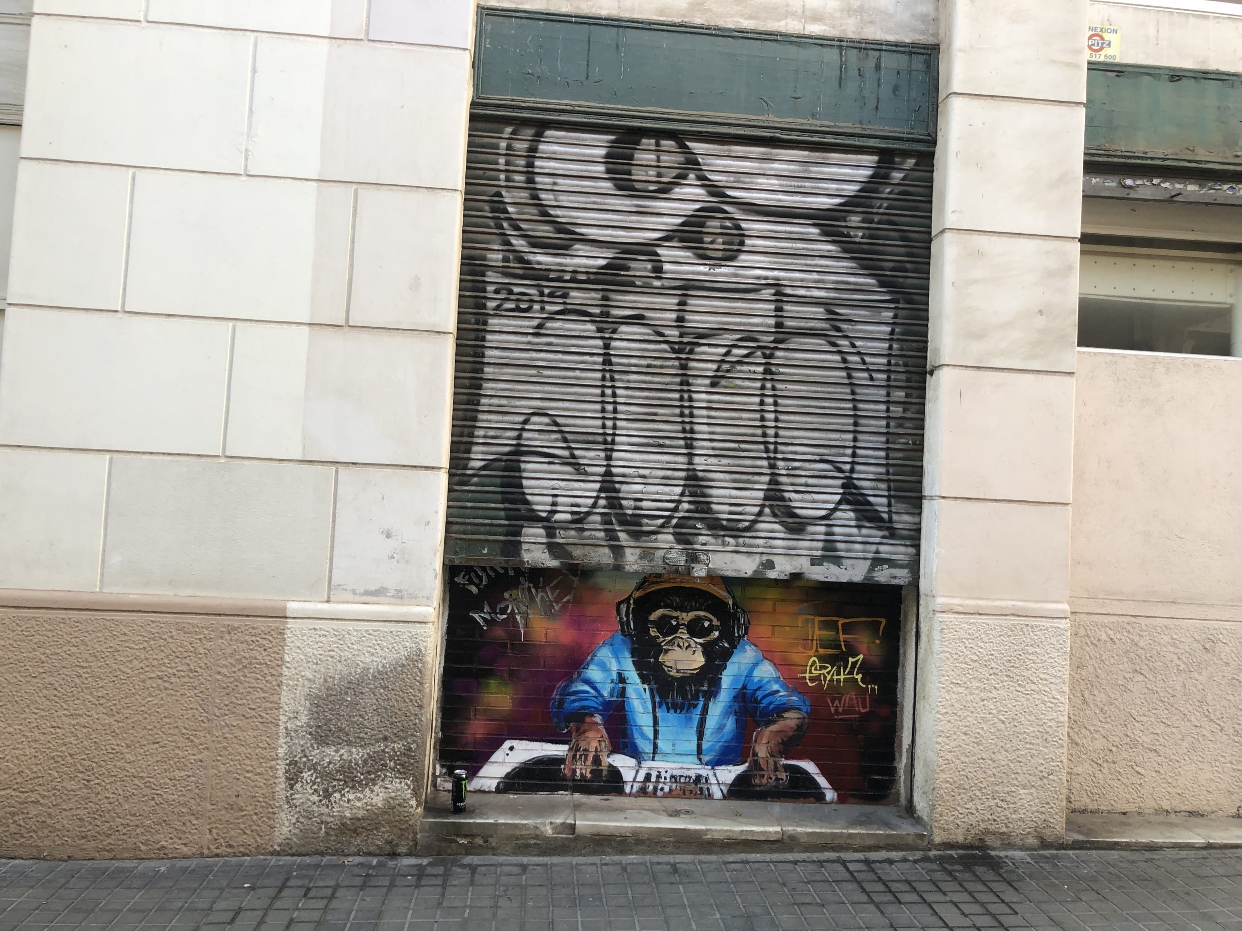 Graffiti art seen in an alley of Gràcia