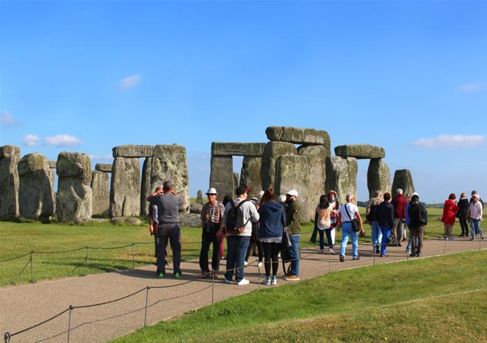 People taking pictures at Stonehenge