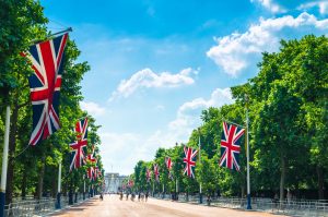 Walking toward Buckingham Palace with UK flags (1)