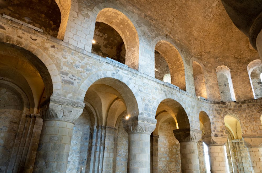 Low angle shot of the arches in an ancient chapel inside the Tower of London, England, UK