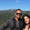 Hollywood Sign with couple posing for photo