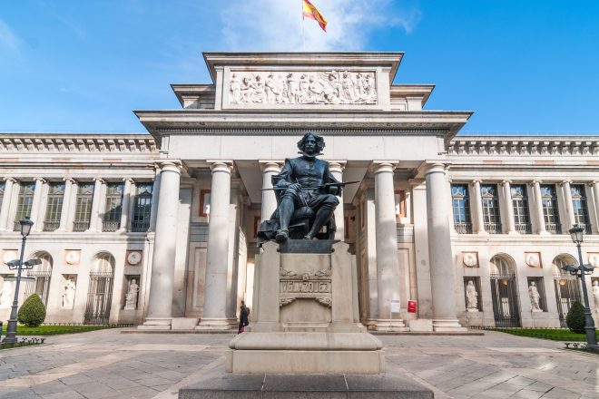 Clear sky and warm day for a visit to The Prado Museum. Front entrance and terrace to the Museo del Prado, Spanish national art museum, located in central Madrid.