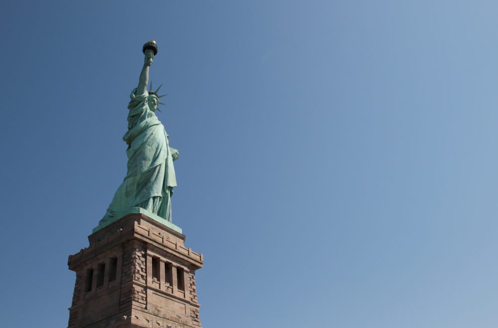 Low-angle shot of Statue of Liberty during the day