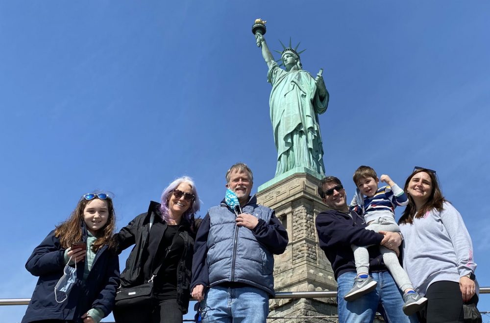 tour group with families at Statue of Liberty