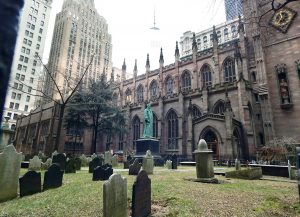 Trinity Church is a church located at the intersection of Wall Street and Broadway south of Manhattan, in New York City.
