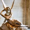 louvre sculpture of angel and woman kissing