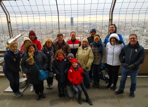 Tour group in winter on Eiffel Tower