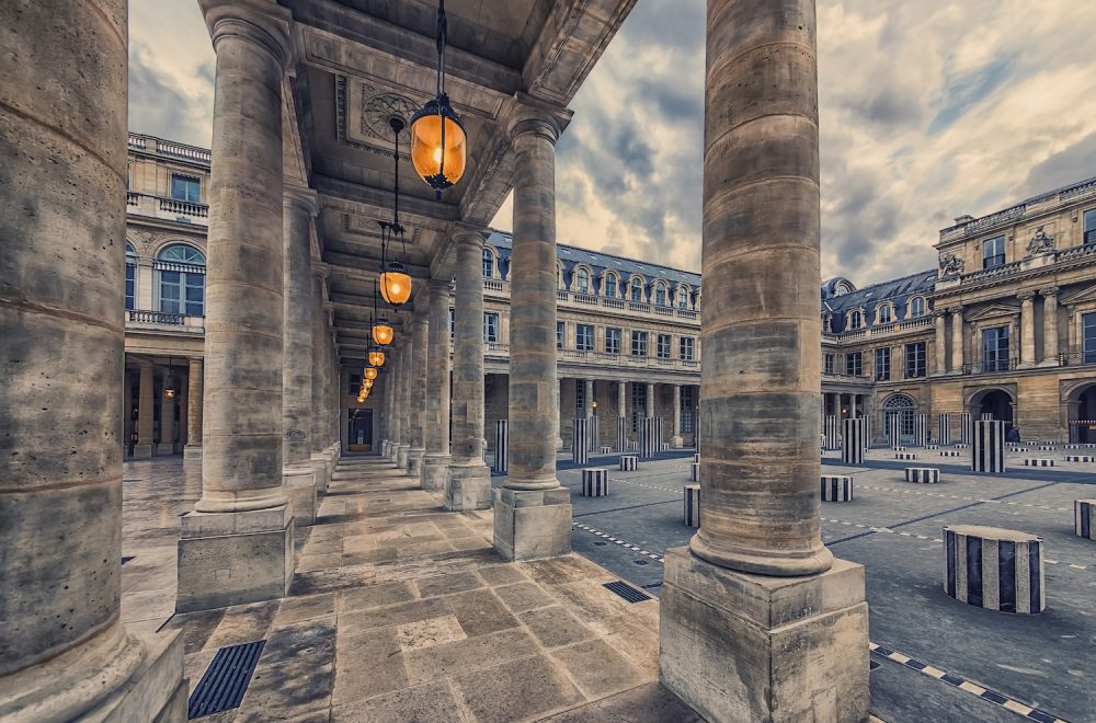 Palais Royal courtyard in Paris, France, where the Colonnes de Buren art installation is located