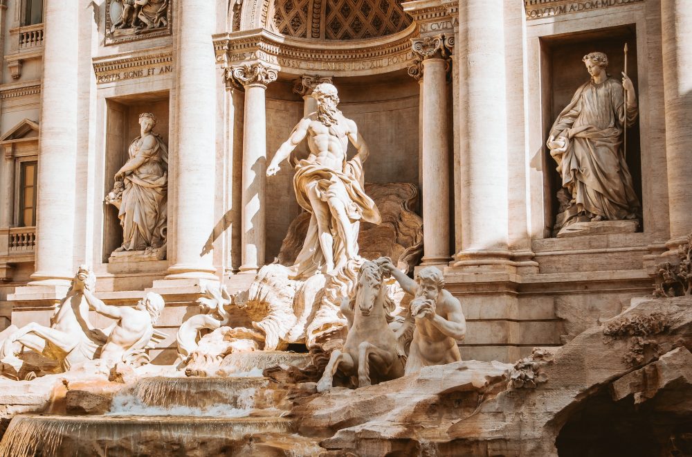 people and horses statue monument at daytime