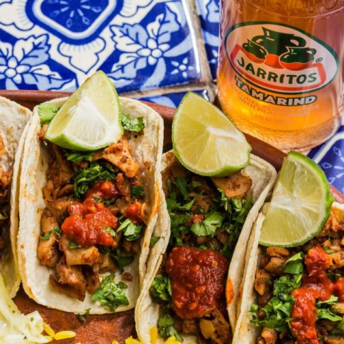 Gourmet Mexican street food tacos and mexican soda