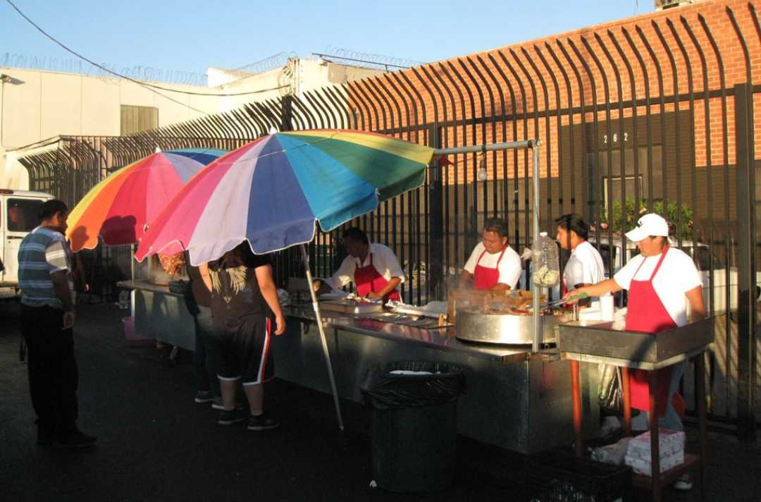 Umbrellas and people standing