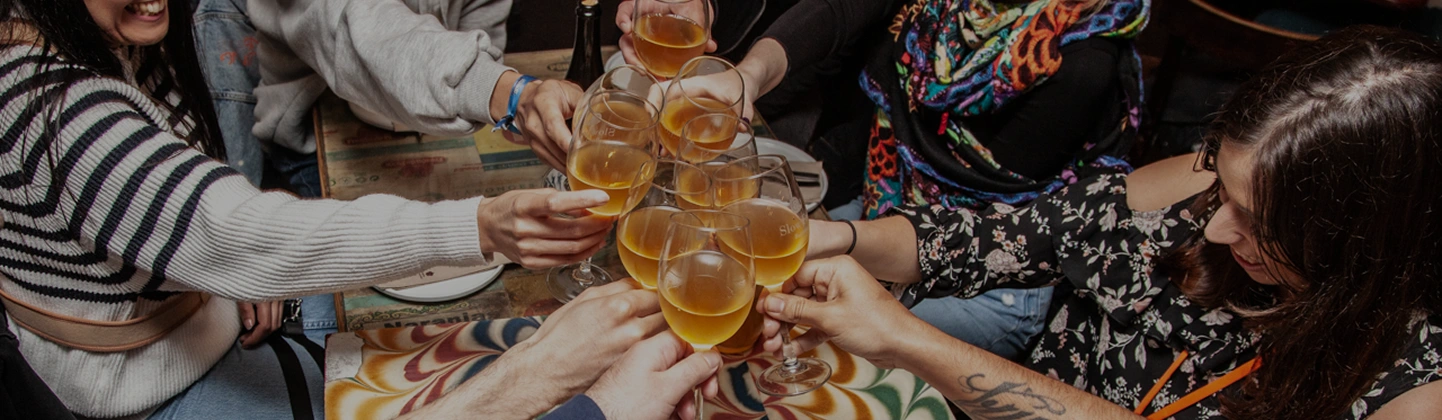 Dinner guests drinking wine