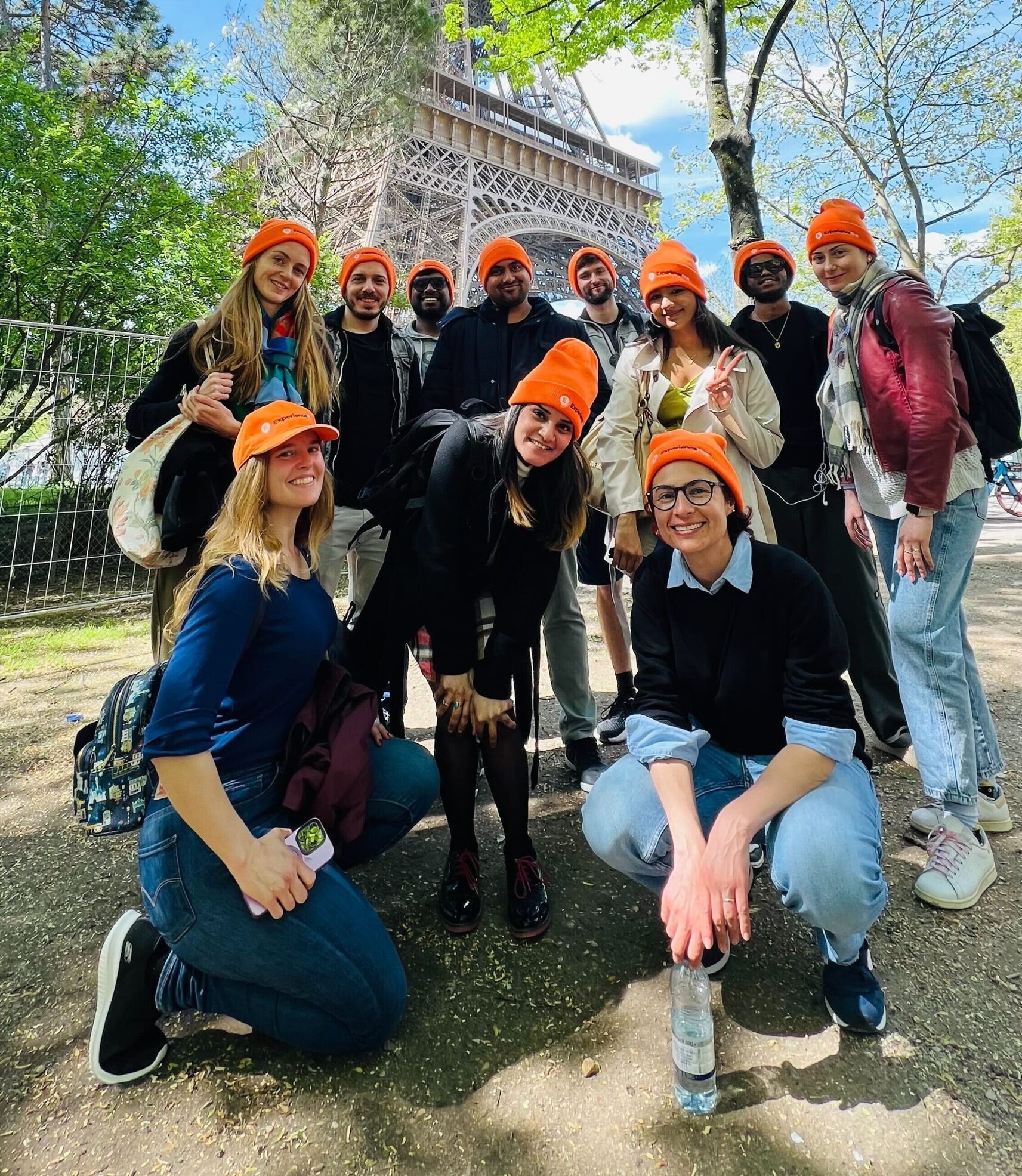 ExperienceFirst team photo at the Eiffel Tower in Paris