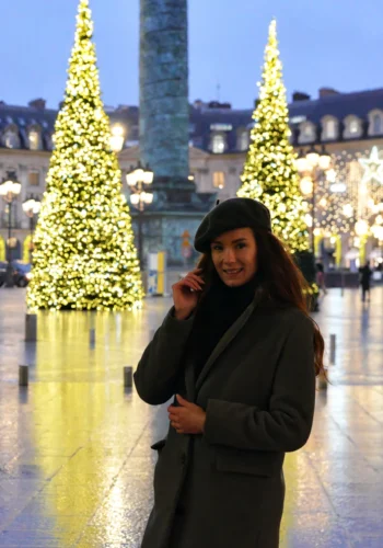 Woman smiling during private Paris Christmas Lights guided tour