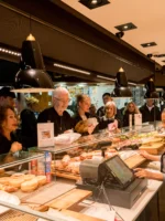 Customers at bakery ordering in Barcelona