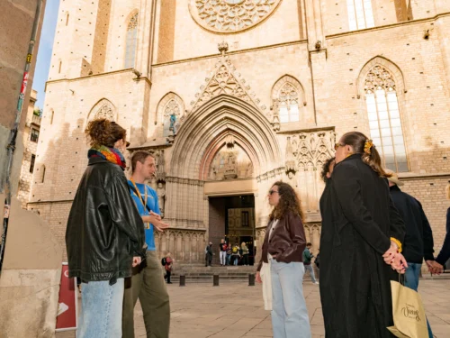 Tour guide and guests outside in Barcelona during Markets tour